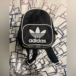 Adidas originals Santiago mini backpack in the color black/white